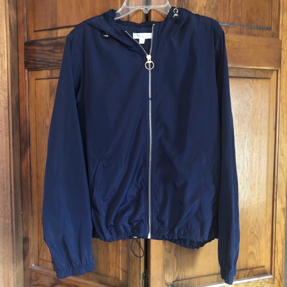 day to day lightweight navy hooded jacket. Silver zip up front.